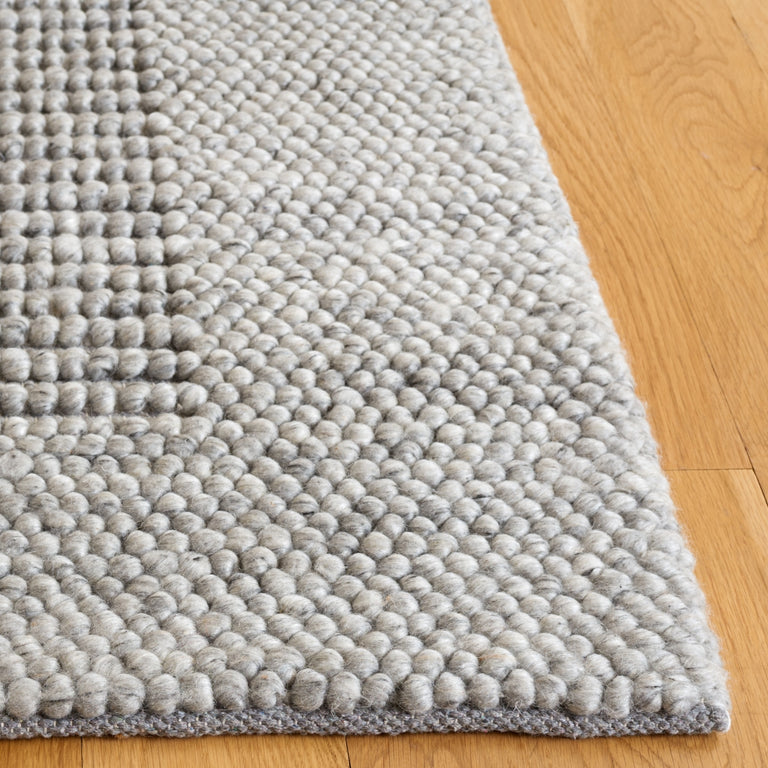 EDLUND HAND WOVEN RUG