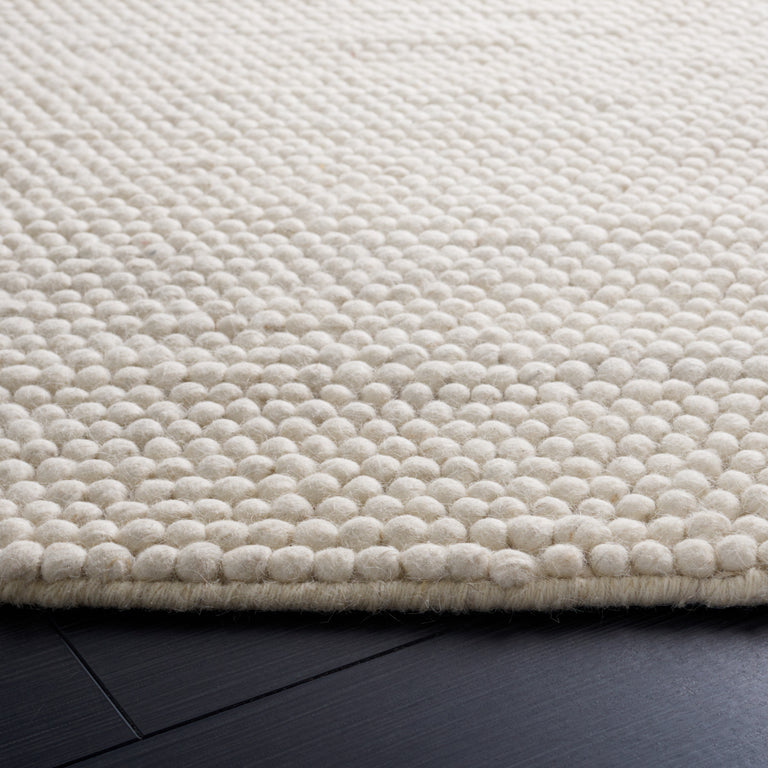 ELMSAATER HAND WOVEN RUG