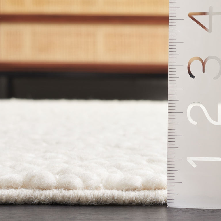 ENBOM HAND TUFTED RUG