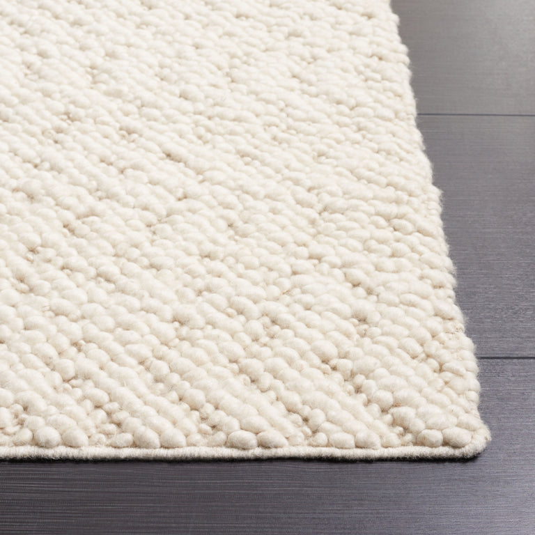 ENBOM HAND TUFTED RUG