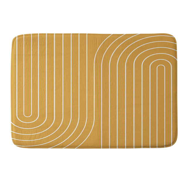 COLOUR POEMS MINIMAL LINE CURVATURE GOLD MEMORY FOAM BATH MAT