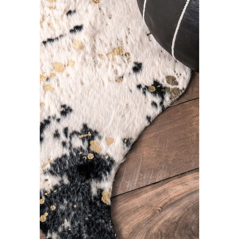 SPOTTED FAUX COWHIDE RUG