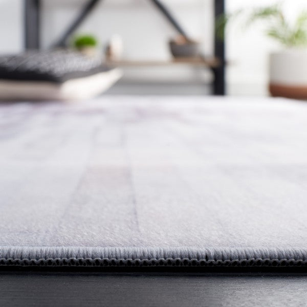 LANÚS FAUX HIDE AREA RUG | STAG & MANOR