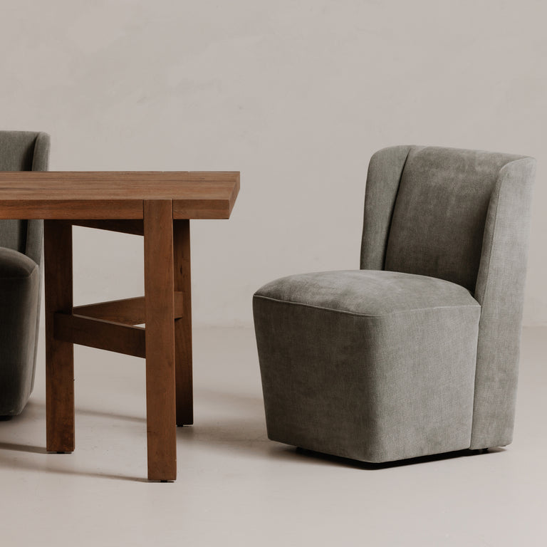 CORMAC ROLLING DINING CHAIR CREAM