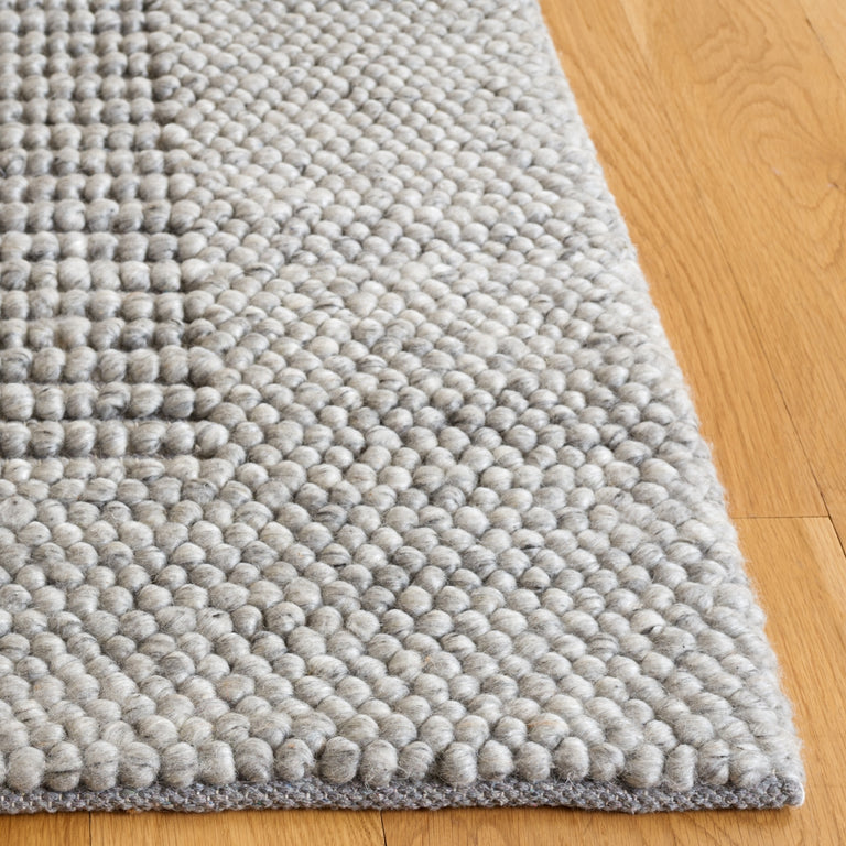 EDLUND HAND WOVEN RUG