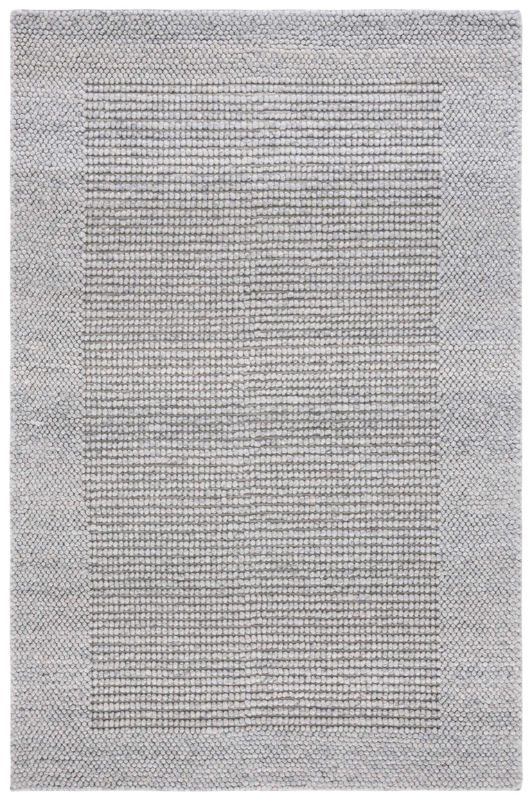 EDLUND HAND WOVEN RUG