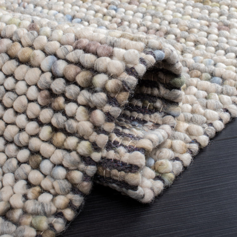 ELMSAATER HAND WOVEN RUG