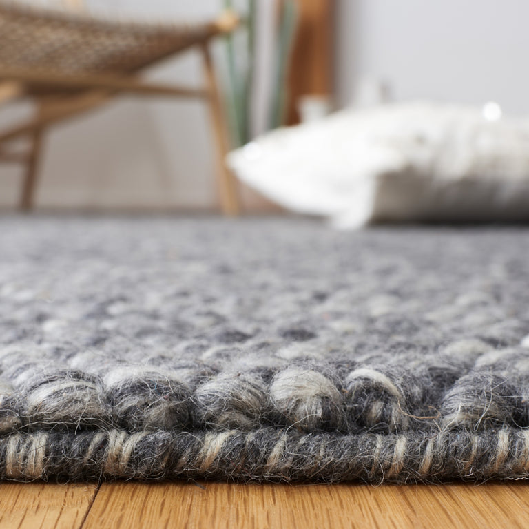 ELMSAATER HAND WOVEN RUG