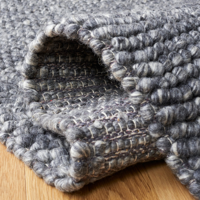 ELMSAATER HAND WOVEN RUG