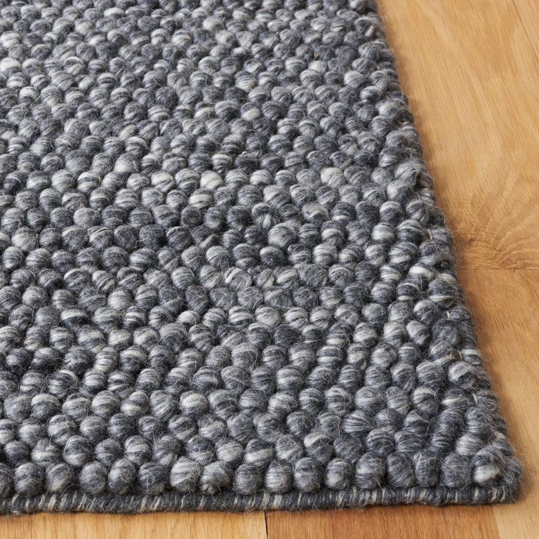 ELMSAATER HAND WOVEN RUG