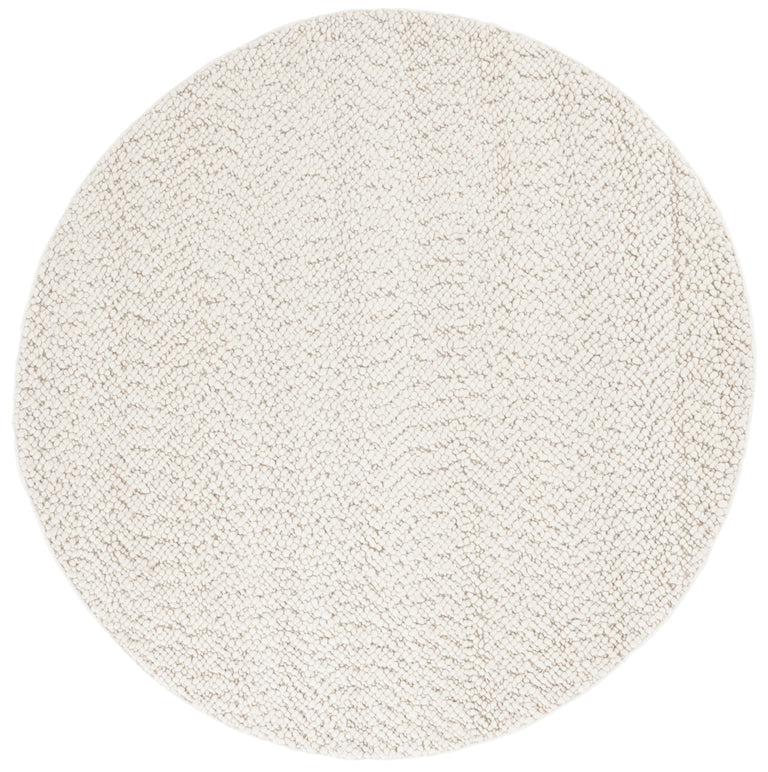 ENBOM HAND TUFTED RUG