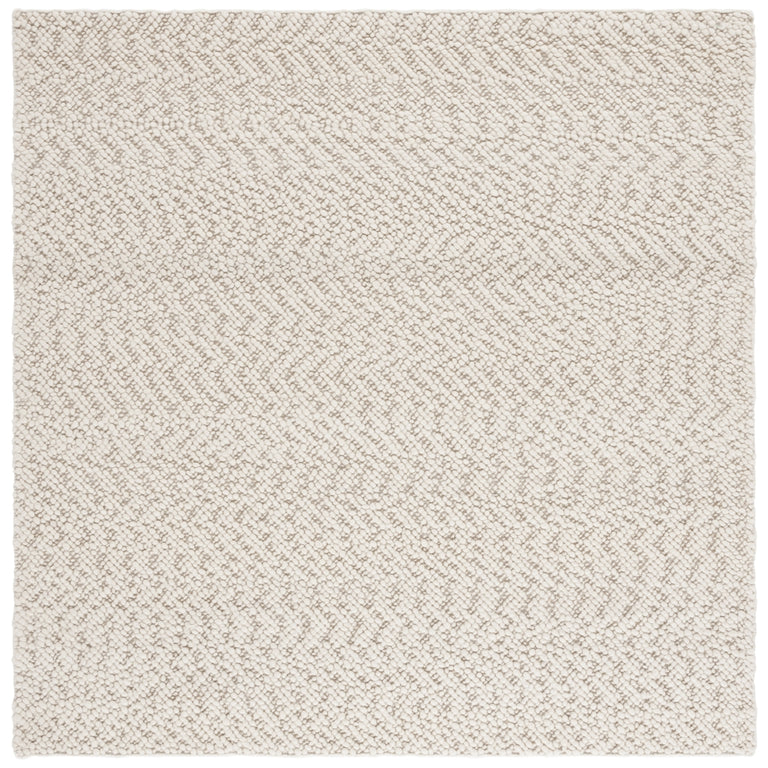 ENBOM HAND TUFTED RUG