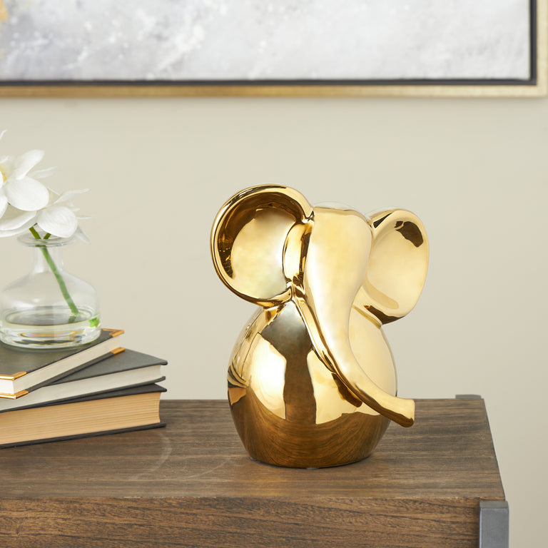 GOLD CERAMIC SHY ELEPHANT | FIGURINE