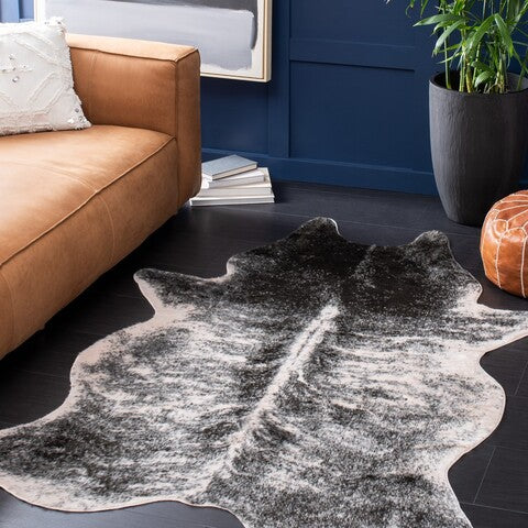 ROSARIO FAUX COWHIDE AREA RUG | STAG & MANOR